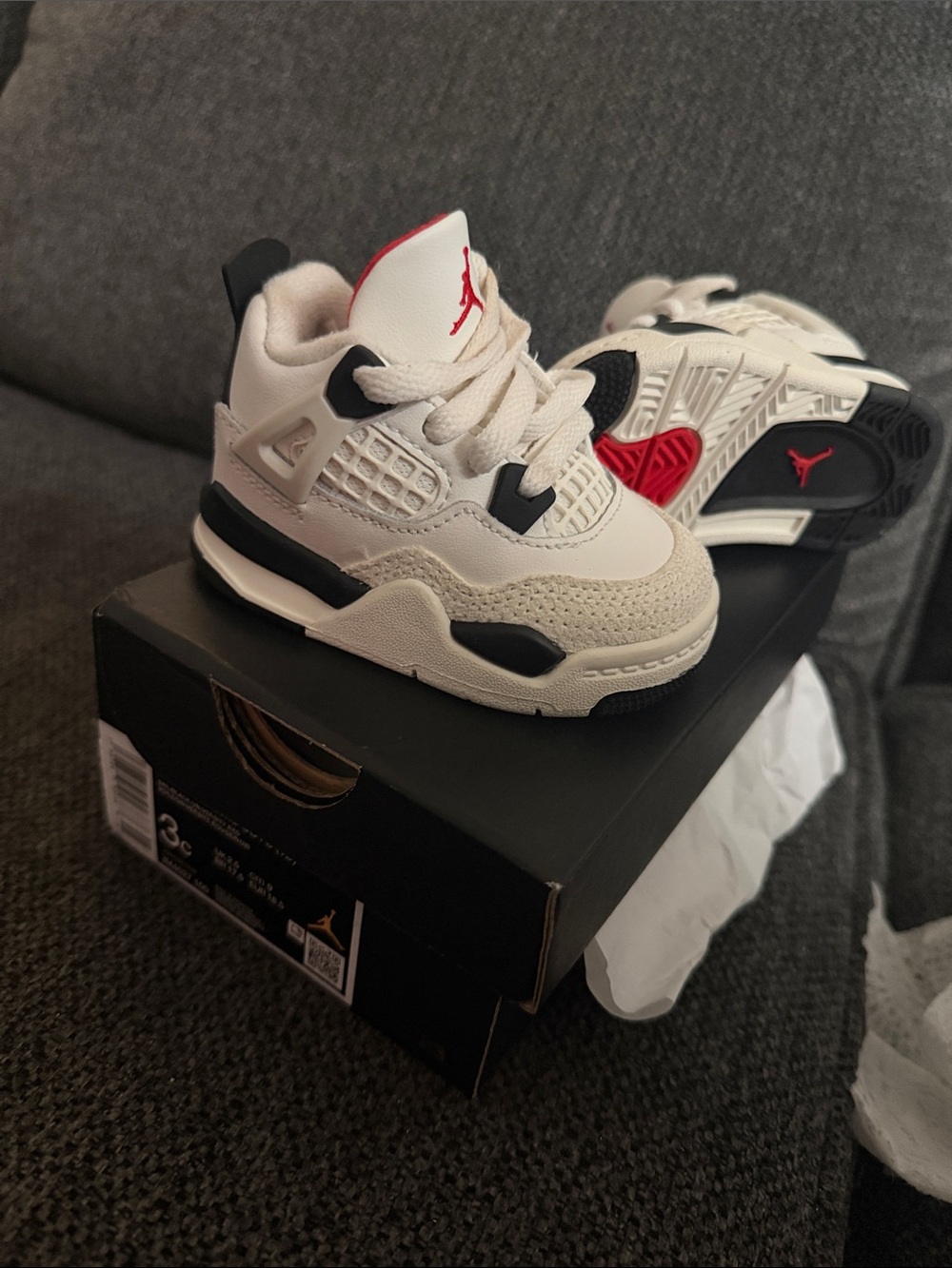 Jordan White and Black Retro Sneaker on Box
